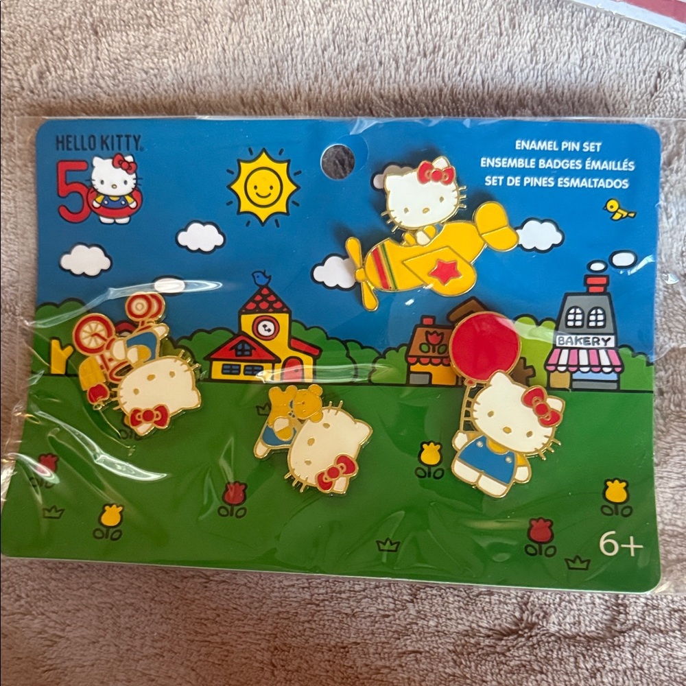 Hello Kitty Enamel Pin Set - Red, Yellow, Blue